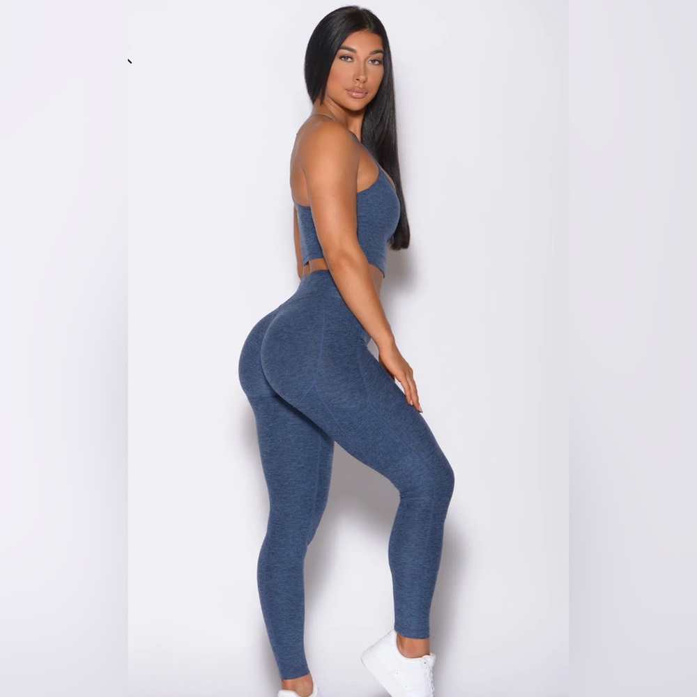 Bombshell “uplift pocket legging” in night sky.